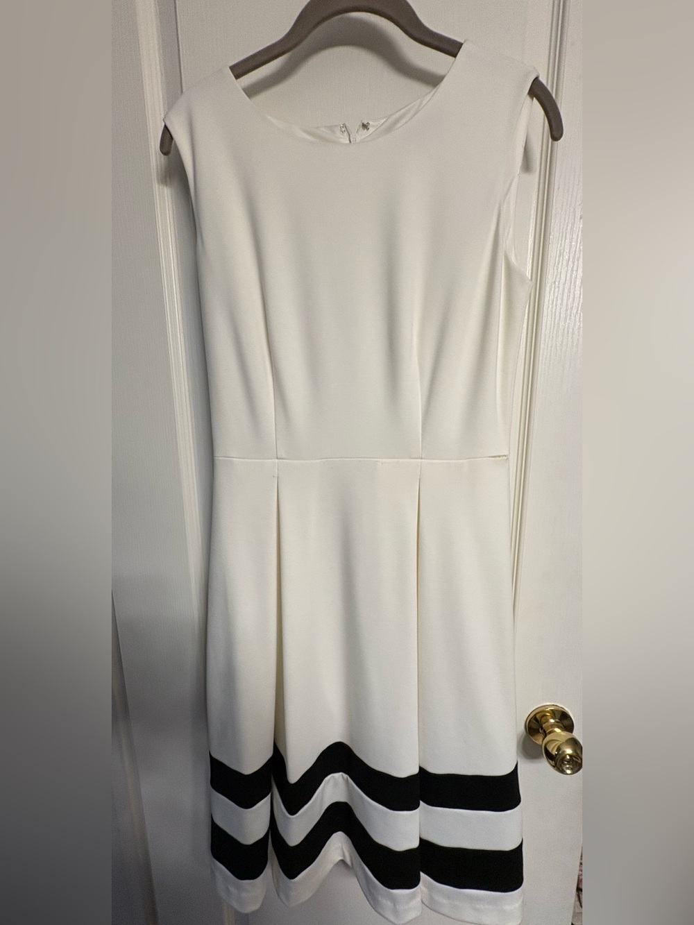 Classic White Fit-and-Flare Midi Dress with Black Striped Hem